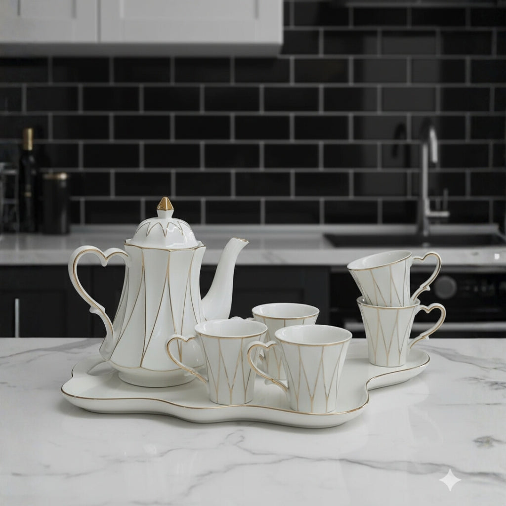 Elegant White & Gold Ceramic Tea Set with heart shaped handle β 8-Piece (1.3L Kettle + 320ml Cups + Tray)